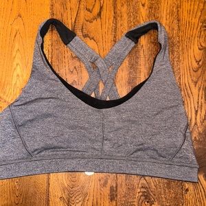 Lululemon Energy sports bra with front pocket.  Size 10